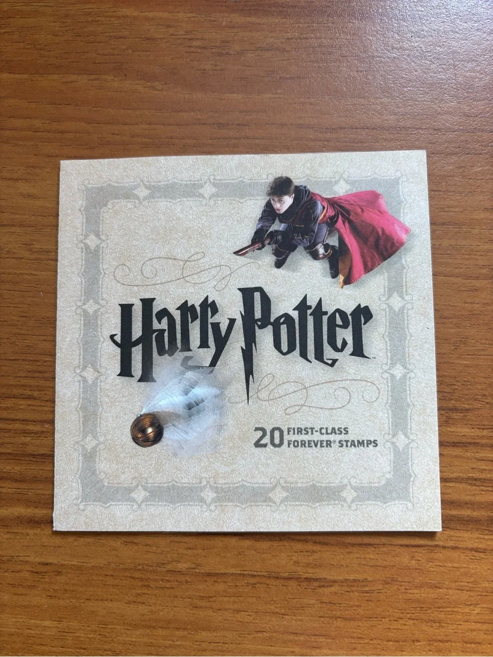 Warner Bros. Harry Potter Stamp Booklet with Red Cloak and Gold Snitch Accents